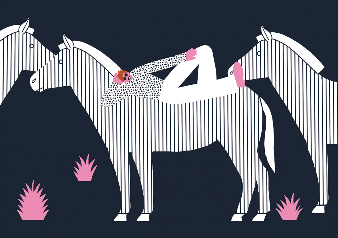 A fancy man lying on a zebra