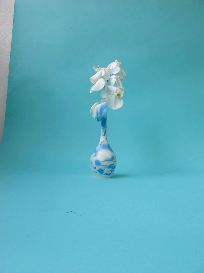 photography of fading flowers in vases created by Carolin Loebbert